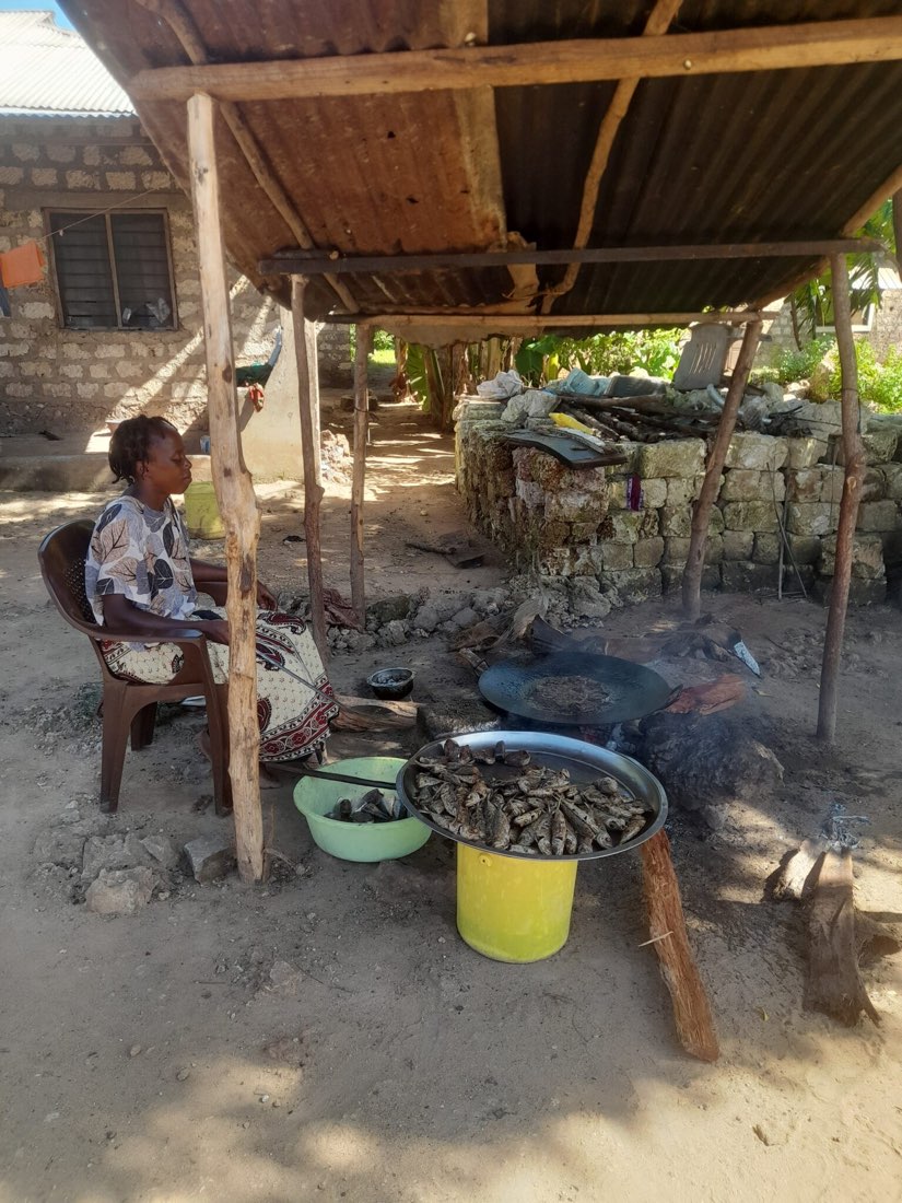 Amina Katana frying fish at her business in Kilifi